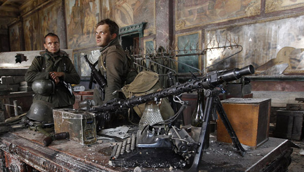 Actors from a new Russian film "Stalingrad" wait on a set  built near the village of Sapernoe outside St.Petersburg